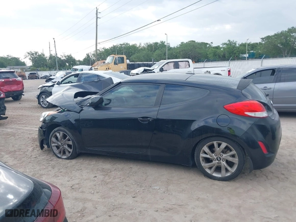 2016 Hyundai Veloster with VIN KMHTC6AD6GU251094, listed as a IAAI auction lot 41971550 with 97,744 mi miles. Bid and sale history available at carsss.com. Image 14.