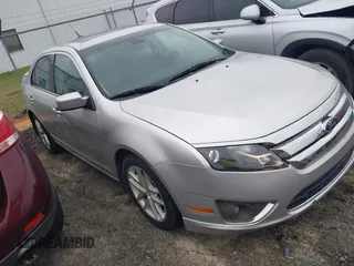 2012 Ford Fusion SEL z VIN 3FAHP0JA4CR191566, wystawiony jako IAAI lot #42358149 z przebiegiem 141 929 mil mil oraz . Historia ofert i sprzedaży dostępna na DreamBid. Obrazek 1.