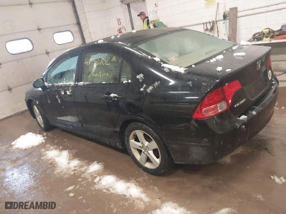 2006 Honda Civic Sdn EX with VIN 1HGFA16806L026147, listed as a IAAI auction lot 41932702 with 215,651 mi miles. Bid and sale history available at carsss.com. Image 3.