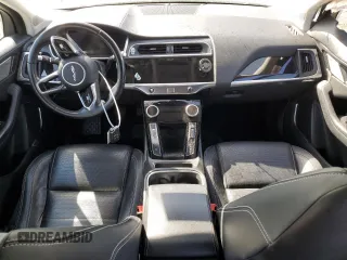 2019 Jaguar I-Pace SE z VIN SADHC2S19K1F68022, wystawiony jako Copart lot #77405114 z przebiegiem Nie podano mil oraz Szkoda całkowita • Salvage title. Historia ofert i sprzedaży dostępna na DreamBid. Obrazek 8.