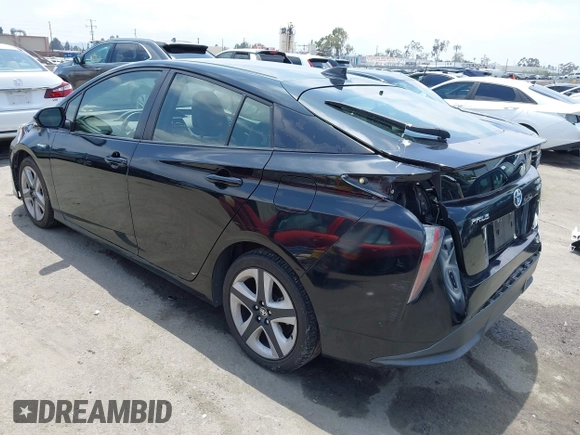 2017 Toyota Prius Two with VIN JTDKARFUXH3041668, listed as a IAAI auction lot 42421754 with 57,677 mi miles and . Bid and sale history available at DreamBid. Image 3.