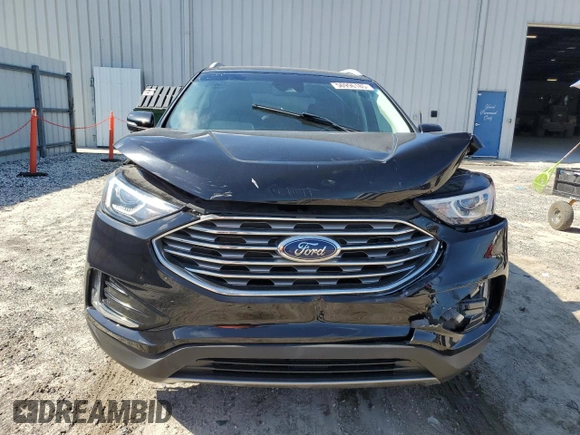 2020 Ford Edge SEL с VIN 2FMPK3J93LBA57329, выставлен на аукционе Copart как лот 56996185 с пробегом 120 631 миль миль и На запчасти • Non repairable. История ставок и продаж доступна на DreamBid. Изображение 5.