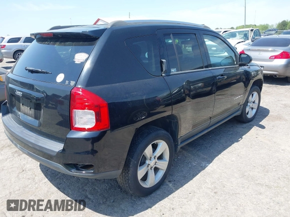 2013 Jeep Compass Sport with VIN 1C4NJCBB6DD102369, listed as a IAAI auction lot 42027866 with 149,937 mi miles. Bid and sale history available at carsss.com. Image 4.