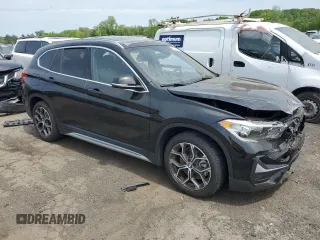 2021 BMW X1 xDrive28i z VIN WBXJG9C07M5S53523, wystawiony jako Copart lot #55450635 z przebiegiem 29 539 mil mil oraz Szkoda całkowita • Salvage title. Historia ofert i sprzedaży dostępna na DreamBid. Obrazek 4.