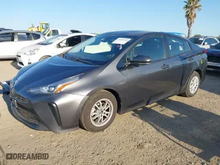 2020 Toyota Prius L Eco with VIN JTDKARFUXL3117737, listed as a IAAI auction lot 41988550 with 64,865 mi miles. Bid and sale history available at carsss.com. Image 18.