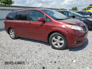 2015 Toyota Sienna LE AAS with VIN 5TDKK3DC7FS600464, listed as a Copart auction lot 61385735 with 159,748 mi miles and Clean title. Bid and sale history available at DreamBid. Image 4.