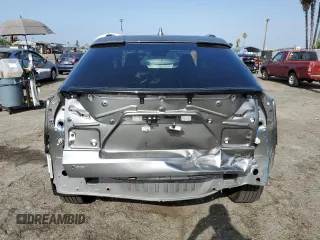 2024 Toyota bZ4X XLE with VIN JTMAAAAAXRA032394, listed as a Copart auction lot 69088814 with 8,184 mi miles and Salvage Title. Bid and sale history available at carsss.com. Image 6.