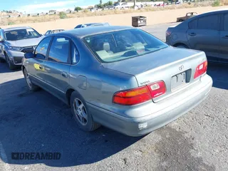 1998 Toyota Avalon XL with VIN 4T1BF18B3WU288614, listed as a IAAI auction lot 40632663 with 185,987 mi miles and . Bid and sale history available at DreamBid. Image 3.