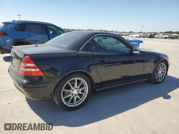 2004 Mercedes-Benz SLK-Class with VIN WDBKK65F24F306069, listed as a Copart auction lot 68791864 with 99,835 mi miles and Salvage Title. Bid and sale history available at carsss.com. Image 3.