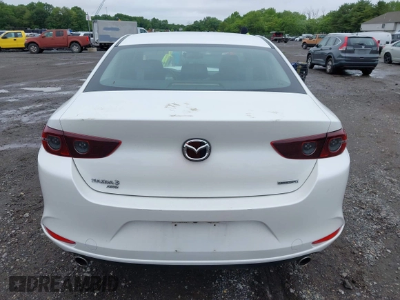 2021 Mazda 3 Preferred z VIN 3MZBPBCL0MM250862, wystawiony jako IAAI lot #42318612 z przebiegiem 86 056 mil mil oraz . Historia ofert i sprzedaży dostępna na DreamBid. Obrazek 16.