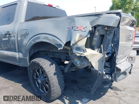 2021 Ford F-150 XL with VIN 1FTEW1CP6MFA09100, listed as a IAAI auction lot 42729047 with 27,593 mi miles and . Bid and sale history available at DreamBid. Image 6.