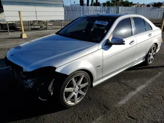 2012 Mercedes-Benz C 350 Sport with VIN WDDGF5HB3CR197400, listed as a Copart auction lot 77010364 with 130,815 mi miles and Salvage Title. Bid and sale history available at DreamBid. Image 1.