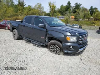 2016 GMC Canyon 4WD SLE with VIN 1GTG6CE3XG1325826, listed as a Copart auction lot 71886394 with 160,658 mi miles and Salvage Title. Bid and sale history available at carsss.com. Image 4.
