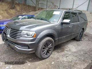 2015 Lincoln Navigator z VIN 5LMJJ3JT3FEJ07172, wystawiony jako IAAI lot #42313343 z przebiegiem 189 807 mil mil oraz . Historia ofert i sprzedaży dostępna na DreamBid. Obrazek 2.