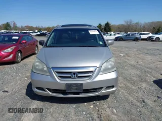 2007 Honda Odyssey EX-L with VIN 5FNRL387X7B080906, listed as a IAAI auction lot 41910061 with 229,717 mi miles and . Bid and sale history available at DreamBid. Image 12.