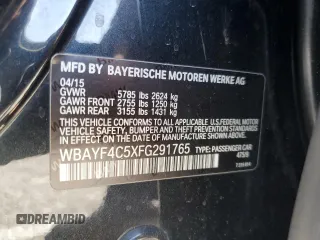 2015 BMW 7 Series 740Li xDrive z VIN WBAYF4C5XFG291765, wystawiony jako Copart lot #58619305 z przebiegiem 174 334 mil mil oraz Szkody całkowita. Historia ofert i sprzedaży dostępna na DreamBid. Obrazek 12.