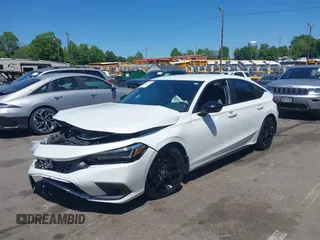 2023 Honda Civic Sport z VIN 19XFL2H84PE019966, wystawiony jako IAAI lot #42137182 z przebiegiem 52 844 mil mil oraz . Historia ofert i sprzedaży dostępna na DreamBid. Obrazek 2.