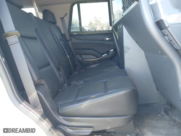 2020 Chevrolet Tahoe Commercial with VIN 1GNSKDEC2LR217697, listed as a IAAI auction lot 40815499 with 128,503 mi miles. Bid and sale history available at carsss.com. Image 8.