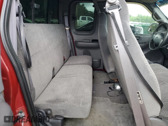 2000 Ford F-150 XL z VIN 1FTRX18LXYNB45648, wystawiony jako Copart lot #60152425 z przebiegiem 92 774 mil mil oraz Szkoda całkowita • Salvage title. Historia ofert i sprzedaży dostępna na DreamBid. Obrazek 10.
