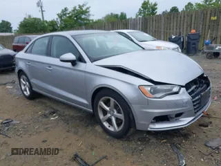 2015 Audi A3 Premium z VIN WAUACGFF9F1141570, wystawiony jako IAAI lot #42356759 z przebiegiem 45 509 mil mil oraz . Historia ofert i sprzedaży dostępna na DreamBid. Obrazek 1.