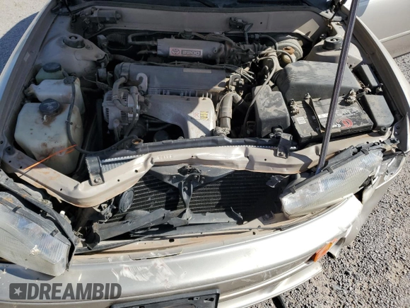 1993 Toyota Camry LE z VIN 4T1SK12E7PU287093, wystawiony jako Copart lot #55682275 z przebiegiem 110 399 mil mil oraz Szkoda całkowita • Salvage title. Historia ofert i sprzedaży dostępna na DreamBid. Obrazek 11.