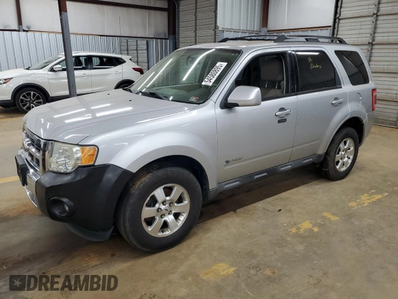 2010 Ford Escape Hybrid with VIN 1FMCU4K31AKC24086, listed as a Copart auction lot 54580895 with 194,510 mi miles and Salvage title. Bid and sale history available at DreamBid. Image 1.