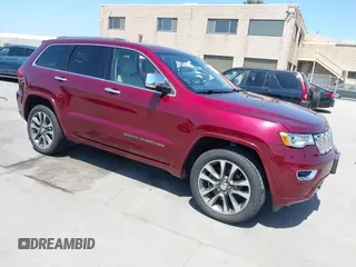 2017 Jeep Grand Cherokee Overland z VIN 1C4RJFCTXHC676236, wystawiony jako IAAI lot #42164645 z przebiegiem 94 658 mil mil oraz . Historia ofert i sprzedaży dostępna na DreamBid. Obrazek 1.