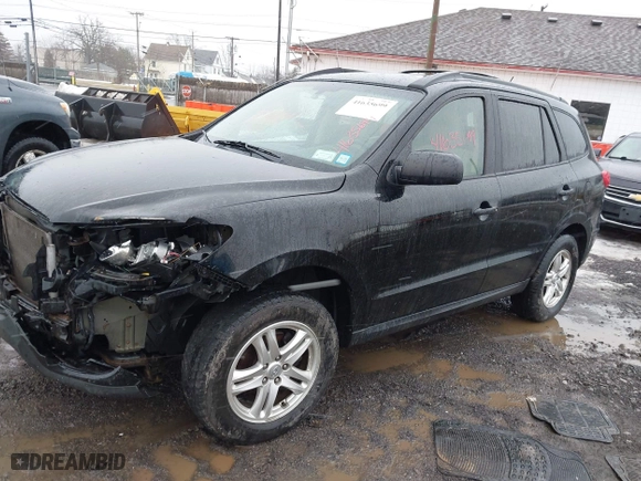 2012 Hyundai Santa Fe GLS with VIN 5XYZG3ABXCG159336, listed as a IAAI auction lot 41635699 with 128,975 mi miles. Bid and sale history available at carsss.com. Image 17.