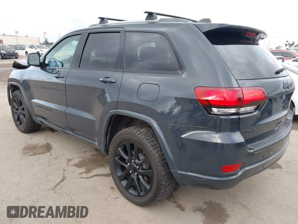 2018 Jeep Grand Cherokee Altitude with VIN 1C4RJFAG4JC122282, listed as a IAAI auction lot 42126483 with 79,184 mi miles and . Bid and sale history available at DreamBid. Image 3.