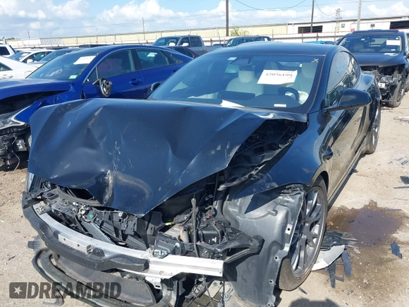 2022 Tesla Model S Plaid with VIN 5YJSA1E63NF478351, listed as a IAAI auction lot 42056199 with Not provided miles and . Bid and sale history available at DreamBid. Image 16.