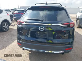 2017 Mazda CX-9 Grand Touring with VIN JM3TCADY5H0129798, listed as a IAAI auction lot 42079754 with 128,403 mi miles and . Bid and sale history available at DreamBid. Image 17.