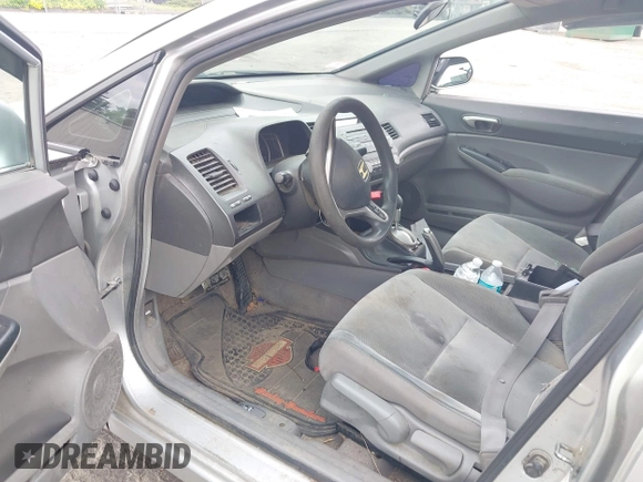 2010 Honda Civic LX with VIN 2HGFA1F59AH323381, listed as a IAAI auction lot 42181040 with 320,419 mi miles and . Bid and sale history available at DreamBid. Image 5.