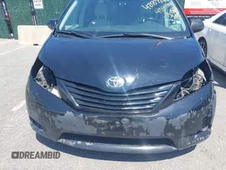 2012 Toyota Sienna LE AAS z VIN 5TDKK3DC1CS254827, wystawiony jako IAAI lot #42557288 z przebiegiem 244 368 mil mil oraz . Historia ofert i sprzedaży dostępna na DreamBid. Obrazek 6.