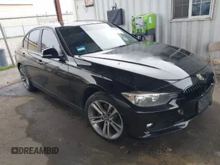 2015 BMW 3 Series 328i with VIN WBA3A5G53FNS89800, listed as a IAAI auction lot 41627009 with 122,413 mi miles. Bid and sale history available at carsss.com. Image 1.