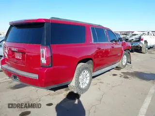 2015 GMC Yukon XL SLT with VIN 1GKS2HKC0FR585406, listed as a IAAI auction lot 41412441 with 210,321 mi miles. Bid and sale history available at carsss.com. Image 4.