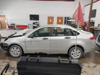 2009 Ford Focus S with VIN 1FAHP34N99W107098, listed as a IAAI auction lot 41610814 with 80,428 mi miles. Bid and sale history available at carsss.com. Image 14.