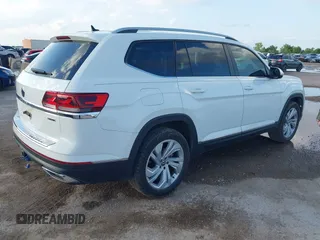 2021 Volkswagen Atlas SEL with VIN 1V2BR2CAXMC522670, listed as a IAAI auction lot 42110724 with 58,802 mi miles and . Bid and sale history available at DreamBid. Image 4.