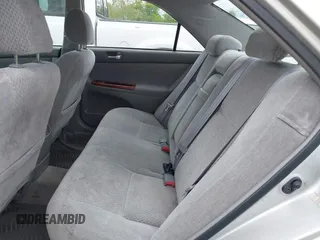 2003 Toyota Camry LE with VIN 4T1BE30K13U168509, listed as a IAAI auction lot 42220735 with 210,328 mi miles and . Bid and sale history available at DreamBid. Image 8.