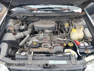1999 Subaru Forester L with VIN JF1SF6351XH702931, listed as a IAAI auction lot 41612373 with 149,171 mi miles. Bid and sale history available at carsss.com. Image 10.