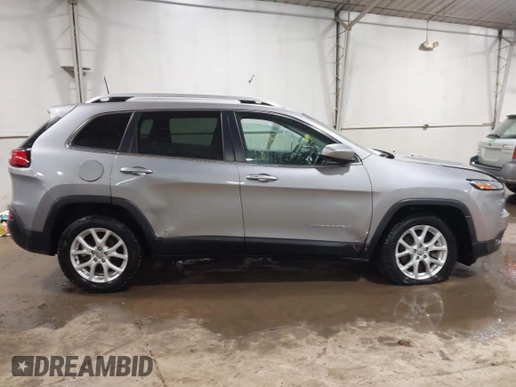 2018 Jeep Cherokee Latitude Plus with VIN 1C4PJLLB4JD524997, listed as a IAAI auction lot 41359742 with 89,858 mi miles. Bid and sale history available at carsss.com. Image 13.