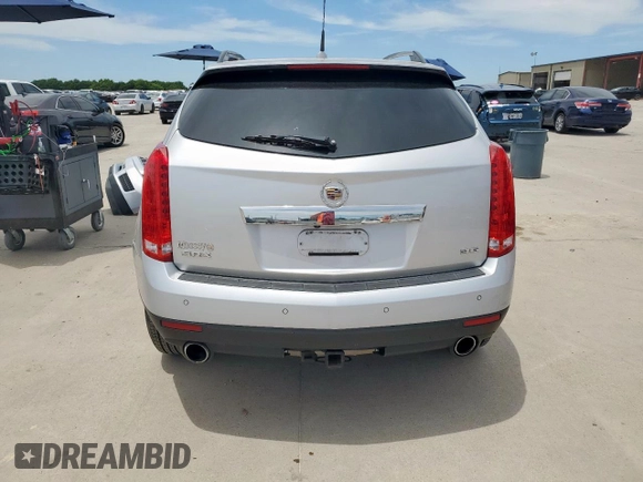 2013 Cadillac SRX Luxury Collection z VIN 3GYFNCE37DS523394, wystawiony jako Copart lot #57817035 z przebiegiem 379 637 mil mil oraz Szkoda całkowita • Salvage title. Historia ofert i sprzedaży dostępna na DreamBid. Obrazek 6.