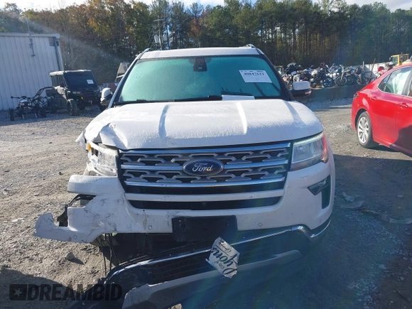 2019 Ford Explorer Limited z VIN 1FM5K7F82KGA03297, wystawiony jako IAAI lot #40847611 z przebiegiem 104 904 mil mil oraz . Historia ofert i sprzedaży dostępna na DreamBid. Obrazek 12.