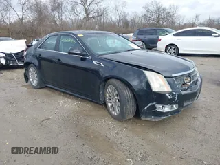 2011 Cadillac CTS Performance with VIN 1G6DL5ED6B0151304, listed as a IAAI auction lot 41720093 with 197,861 mi miles and . Bid and sale history available at DreamBid. Image 1.