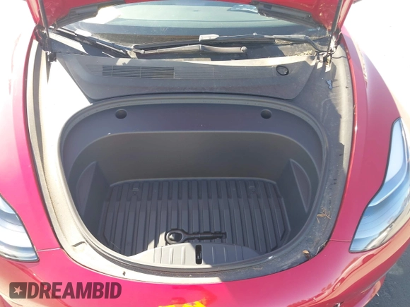 2023 Tesla Model 3 with VIN 5YJ3E1EA1PF385490, listed as a IAAI auction lot 42315884 with 17,590 mi miles and . Bid and sale history available at DreamBid. Image 10.