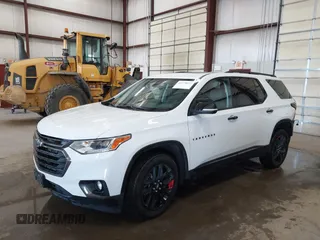 2021 Chevrolet Traverse Premier with VIN 1GNEVKKW0MJ266937, listed as a IAAI auction lot 41378033 with 34,683 mi miles. Bid and sale history available at carsss.com. Image 2.