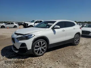 2023 BMW X2 sDrive28i with VIN WBXYH9C00P5V38984, listed as a Copart auction lot 50739725 with 47,287 mi miles and Salvage Title. Bid and sale history available at carsss.com. Image 1.