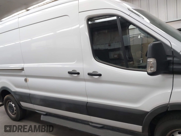 2020 Ford Transit Cargo with VIN 1FTBR1CG8LKB66921, listed as a IAAI auction lot 42325015 with Not provided miles and . Bid and sale history available at DreamBid. Image 14.