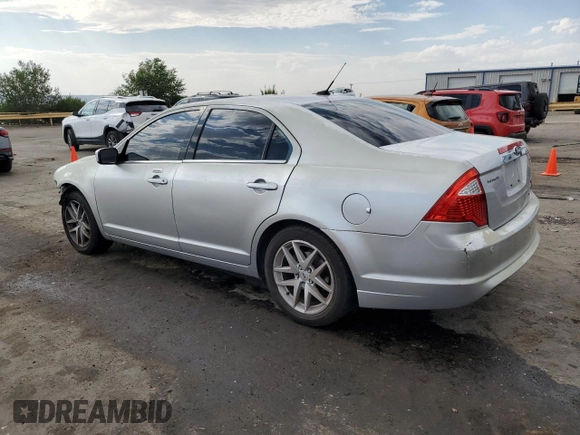 2012 Ford Fusion SEL with VIN 3FAHP0JG7CR257418, listed as a Copart auction lot 61842175 with 167,669 mi miles and Salvage title. Bid and sale history available at DreamBid. Image 2.