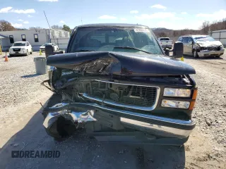 1999 GMC Suburban z VIN 3GKGK26J2XG514835, wystawiony jako Copart lot #47853685 z przebiegiem 124 657 mil mil oraz Tytuł czysty. Historia ofert i sprzedaży dostępna na DreamBid. Obrazek 5.
