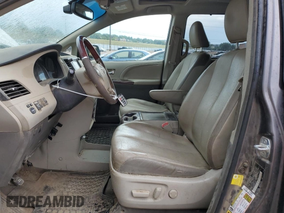 2012 Toyota Sienna XLE with VIN 5TDDK3DC6CS042627, listed as a Copart auction lot 66287715 with 161,548 mi miles and Clean title. Bid and sale history available at DreamBid. Image 7.